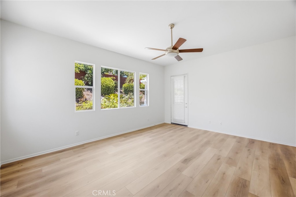 8710 Windmill Place Riverside, CA 92508 - Photo 37 of 66 an empty room with windows and fan