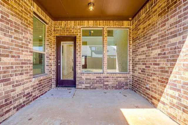 a view of front door of house with a window