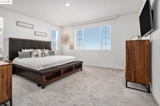 a view of livingroom with washer and dryer