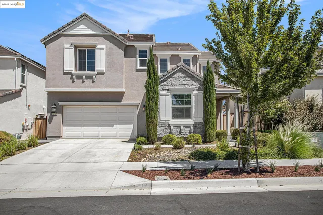 a aerial view of a house with a ocean view