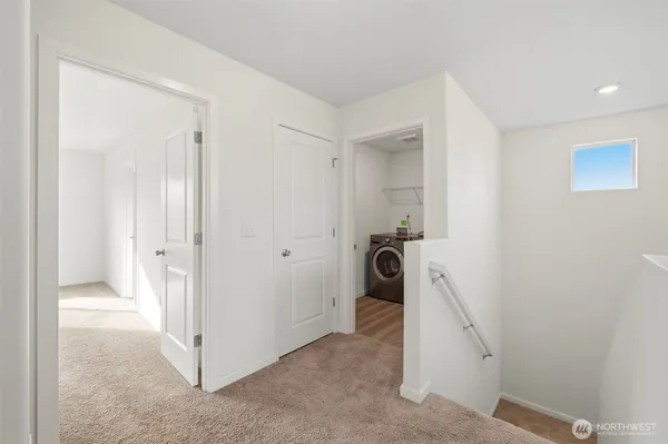 a view of a hallway with closet