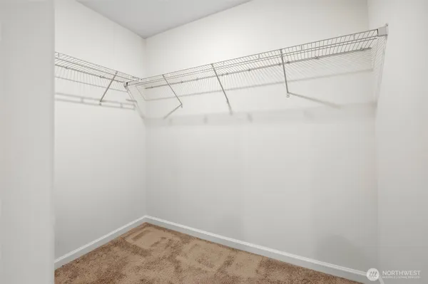 a view of a room with racks on the wall