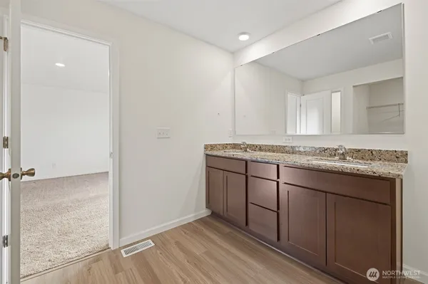 a view of a granite countertop cabinets and a sink
