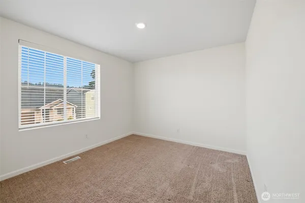 a view of a room with a window