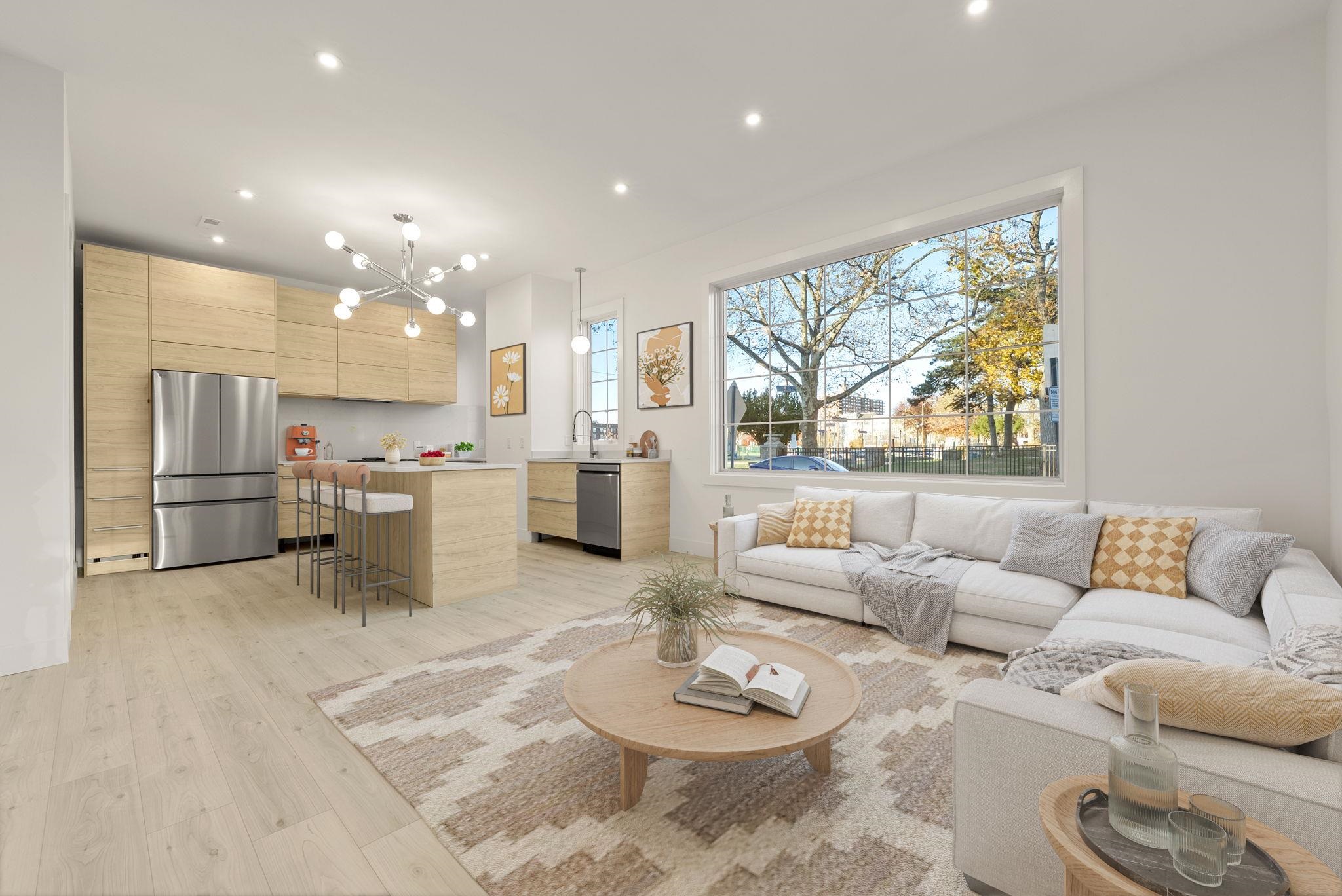 317 Sherman Avenue, Unit 1 Jersey City, NJ 07307 - Photo 1 of 29 a living room with furniture and a large window