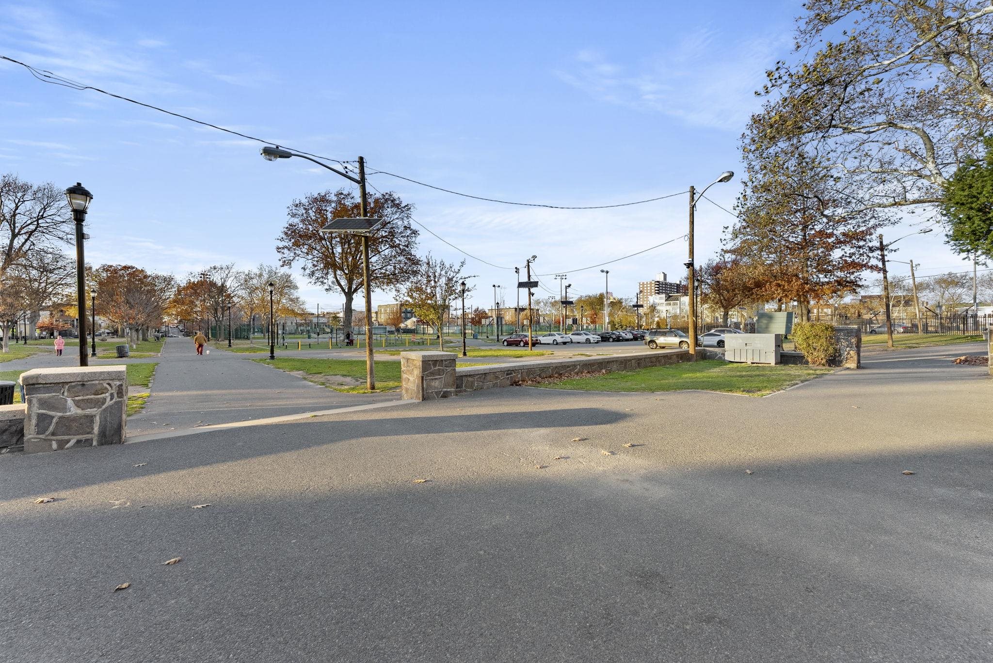317 Sherman Avenue, Unit 1 Jersey City, NJ 07307 - Photo 27 of 29 a view of a street with houses