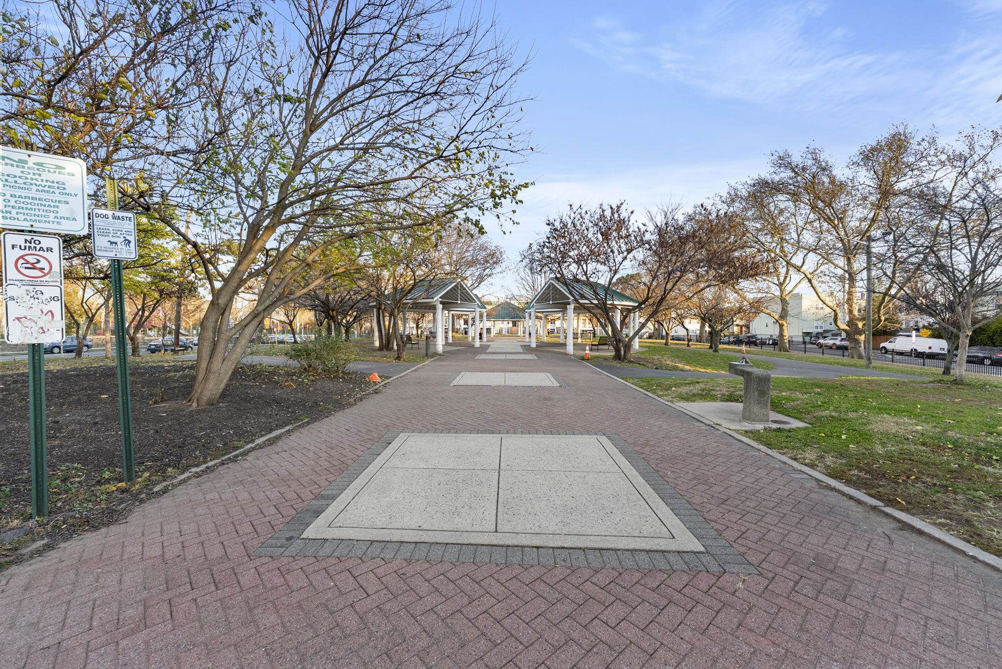 317 Sherman Avenue, Unit 1 Jersey City, NJ 07307 - Photo 28 of 29 a street view with large trees