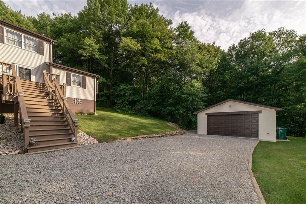 425 Marguerite Road Latrobe, PA 15650 - Photo 2 of 25 OVERSIZED 2 CAR DETACHED GARAGE WITH EXTRA WIDE DRIVEWAY. ADDITIONAL 1 CAR INTEGRAL.