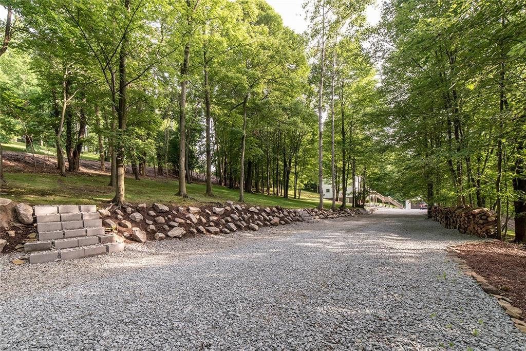 425 Marguerite Road Latrobe, PA 15650 - Photo 24 of 25 TREED DRIVE TO HOME AND GARAGES