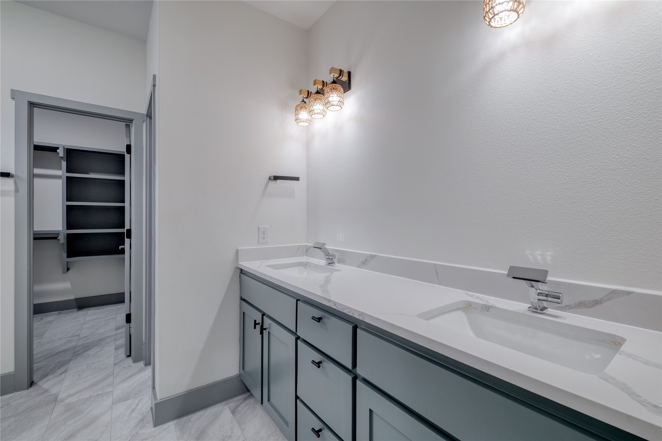 204 Washington Street Elgin, TX 78621 - Photo 11 of 24 a bathroom with a sink and a mirror