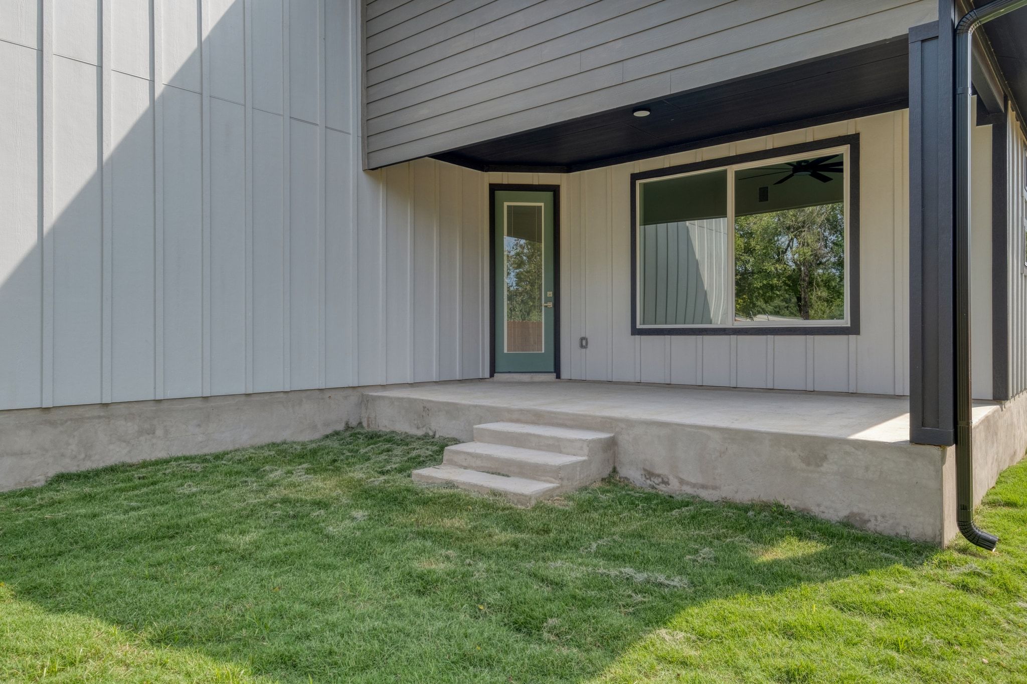 204 Washington Street Elgin, TX 78621 - Photo 22 of 24 a front view of a house with garden