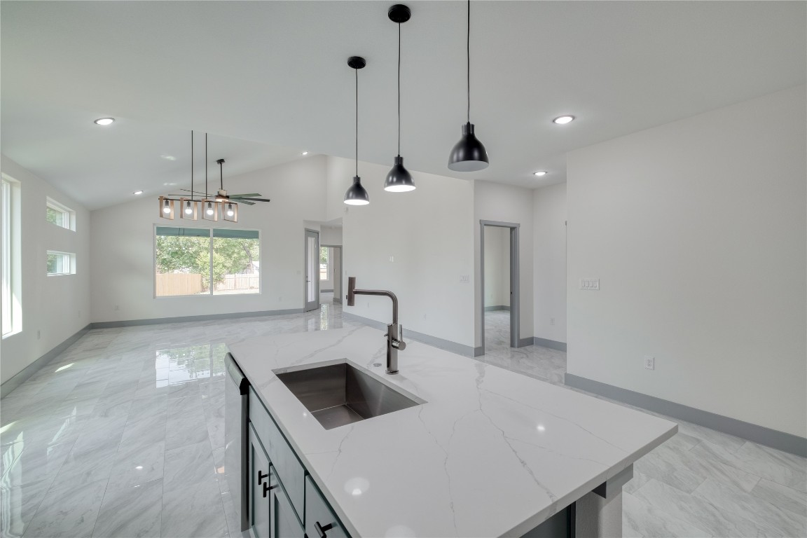 204 Washington Street Elgin, TX 78621 - Photo 6 of 24 Beautiful Sink Island with chic lighting