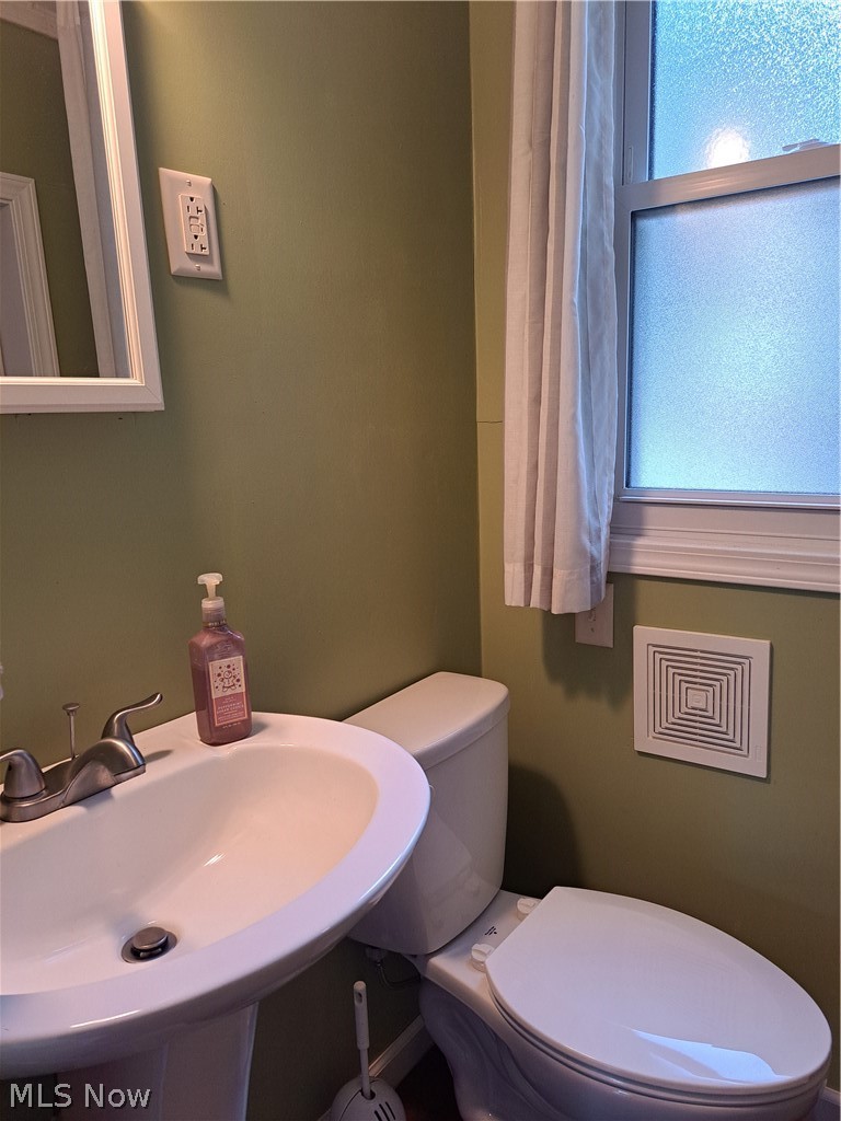 17875 Lashley Road, Unit 124 Senecaville, OH 43780 - Photo 27 of 45 Bathroom featuring sink and toilet