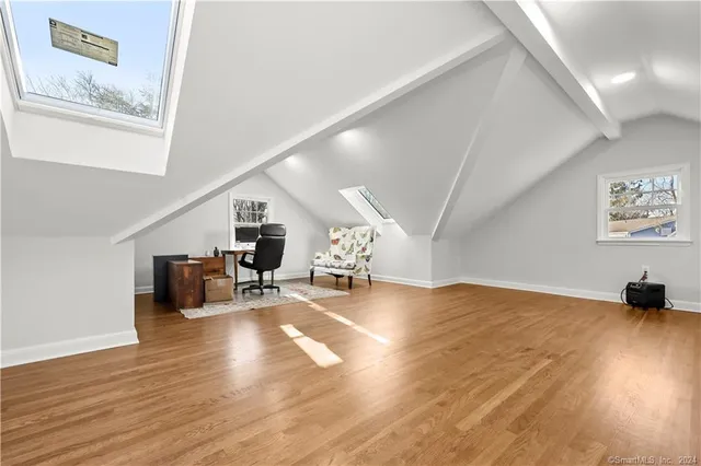 a view of livingroom with furniture and wooden floor
