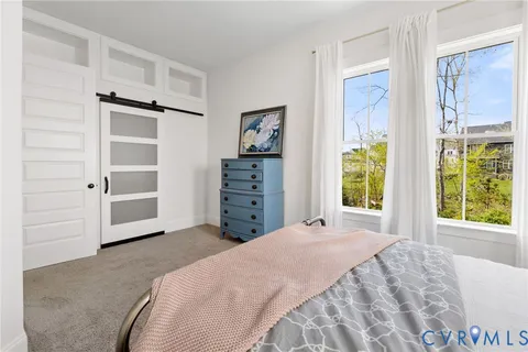 a kitchen with stainless steel appliances a sink a stove and a cabinets