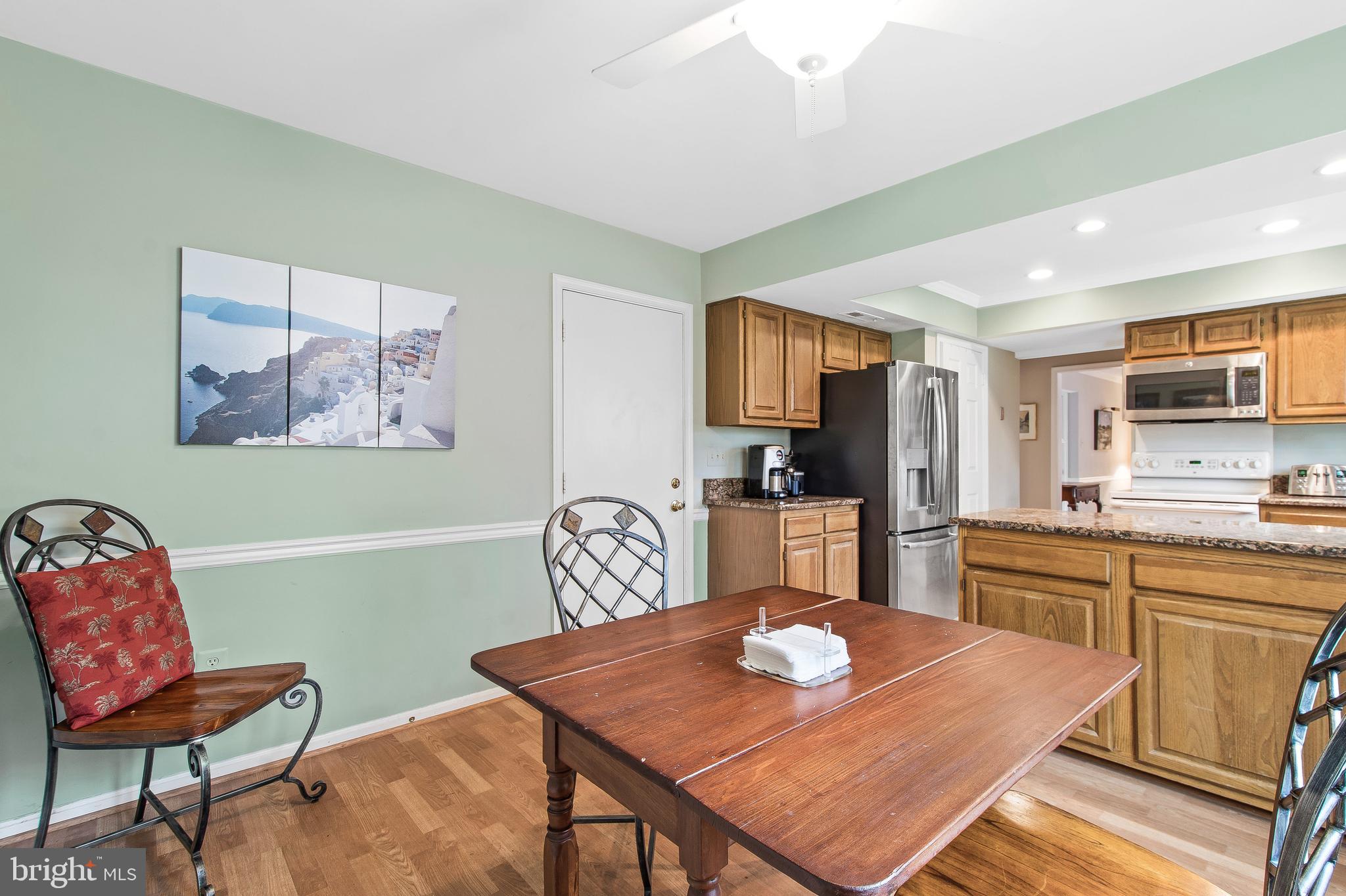 13813 Turnmore Road Silver Spring, MD 20906 - Photo 21 of 38 Breakfast Area w/Pergo Flooring