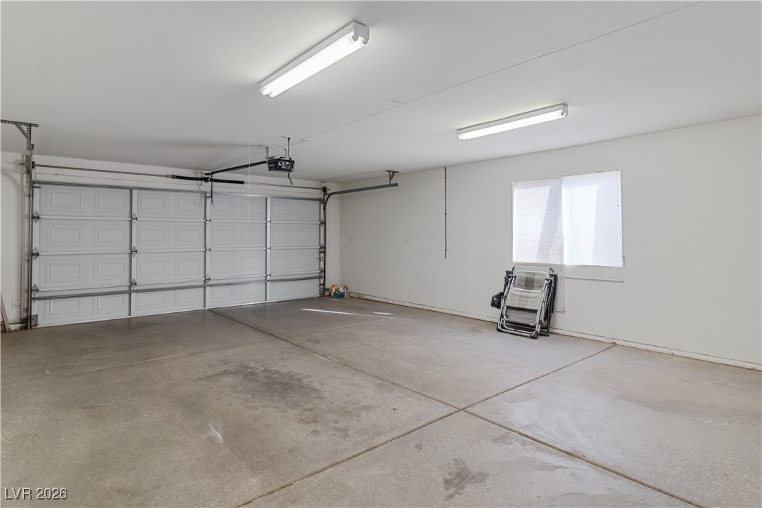 1210 Country Club Drive Laughlin, NV 89029 - Photo 43 of 80 View of large garage with access to home and automatic garage door opener