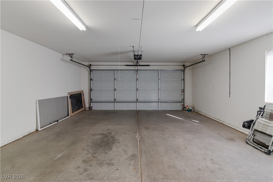 1210 Country Club Drive Laughlin, NV 89029 - Photo 44 of 80 View of large garage with access to home and automatic garage door opener