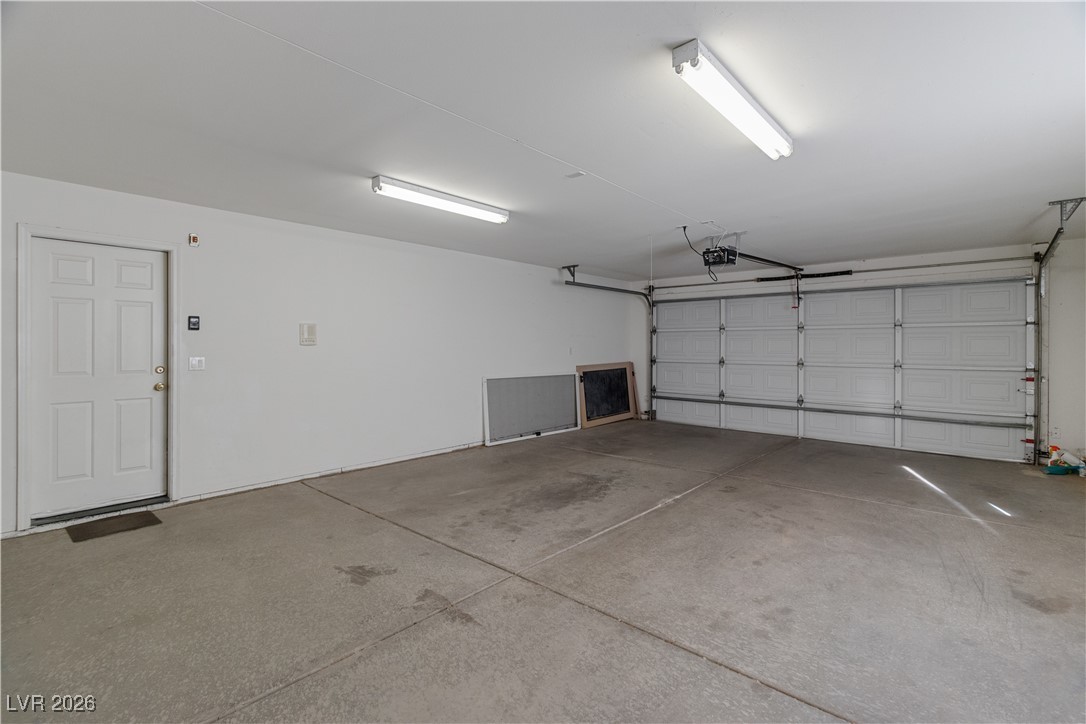 1210 Country Club Drive Laughlin, NV 89029 - Photo 45 of 80 View of large garage with access to home and automatic garage door opener