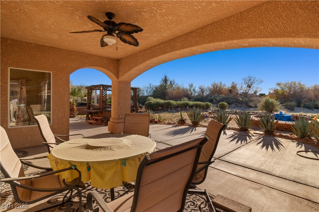 1210 Country Club Drive Laughlin, NV 89029 - Photo 51 of 80 View of back covered patio / terrace featuring outdoor dining area and ceiling fan