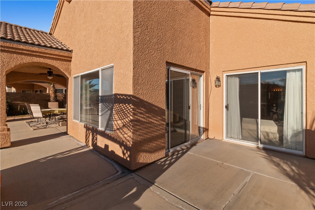 1210 Country Club Drive Laughlin, NV 89029 - Photo 54 of 80 View of patio / terrace featuring ceiling fan and outdoor dining space and patio outside the sliding glass door to the Primary Suite