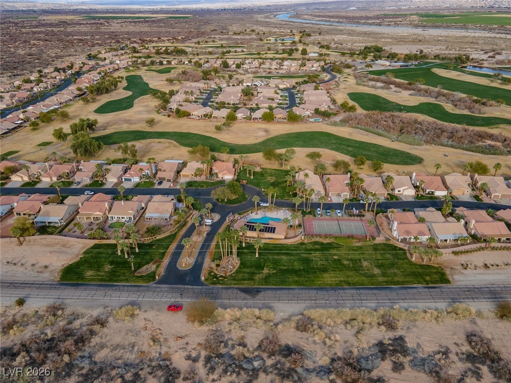 1210 Country Club Drive Laughlin, NV 89029 - Photo 74 of 80 Aerial view of the Desert Springs community gated entry, Clubhouse, Pool and Spa, and Tennis Courts all on the Golf Course