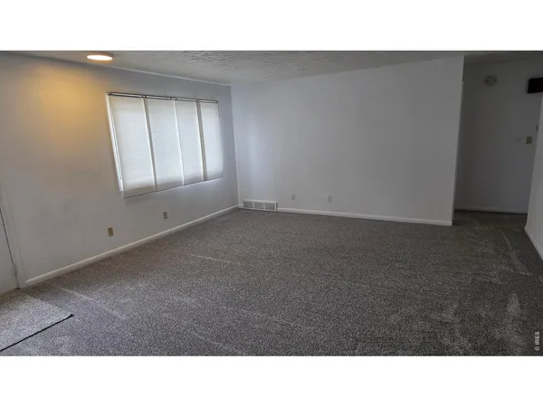 a open hall with a back yard