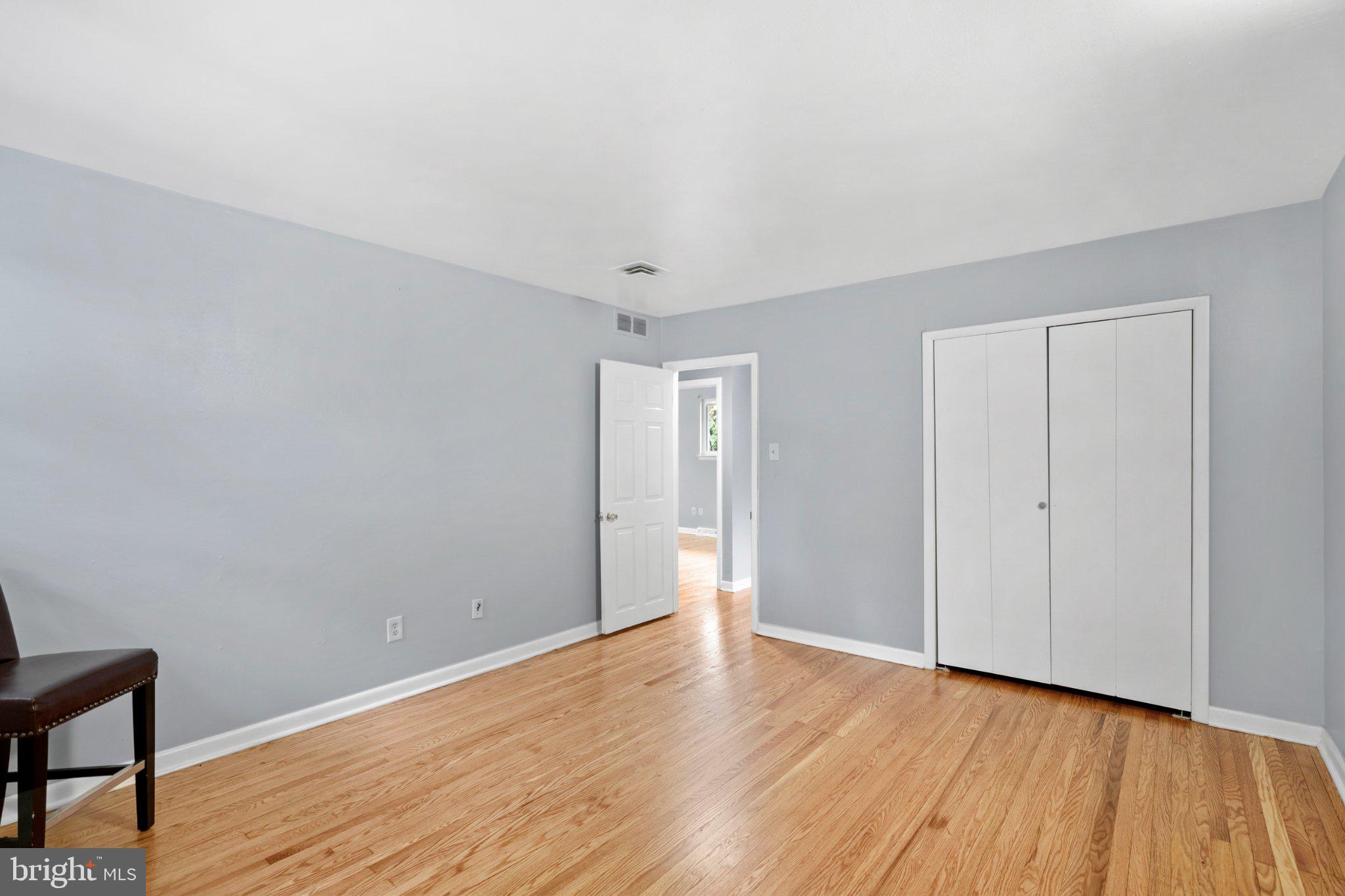 609 Foster Road Cheltenham, PA 19012 - Photo 31 of 44 Spacious room with serene hues.