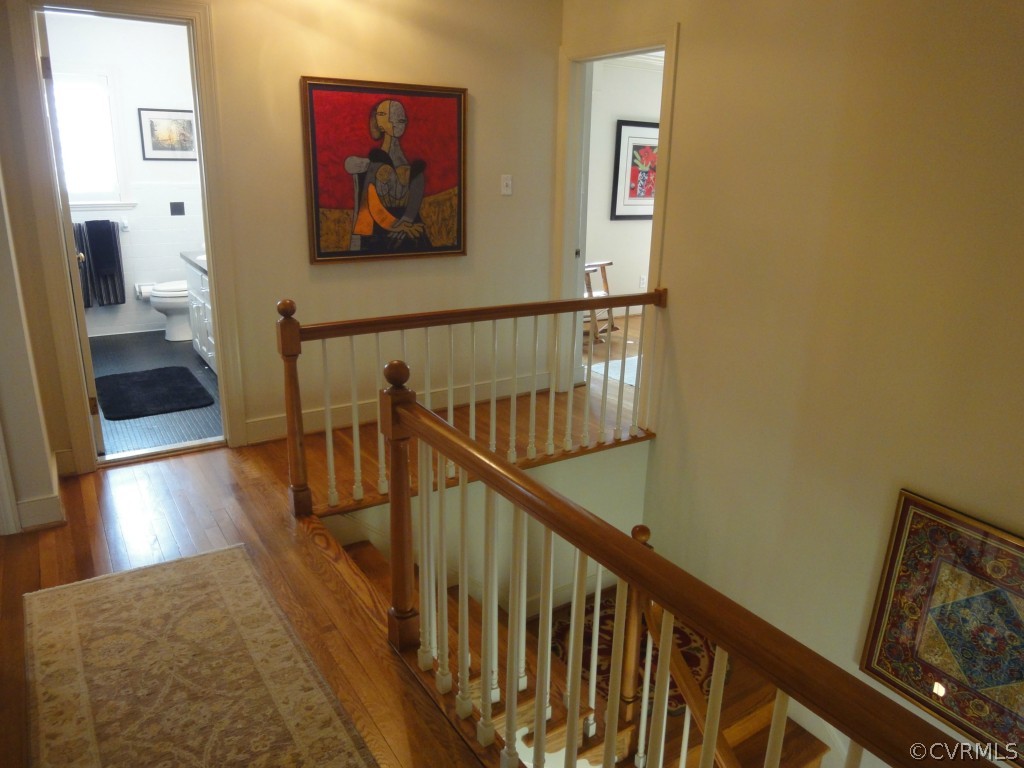 2716 East Brigstock Road Midlothian, VA 23113 - Photo 17 of 24 a view of hallway with wooden floor and stairs
