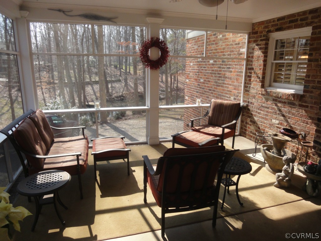 2716 East Brigstock Road Midlothian, VA 23113 - Photo 22 of 24 a view of a dining room with furniture and chandelier