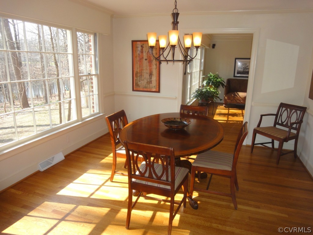 2716 East Brigstock Road Midlothian, VA 23113 - Photo 10 of 24 a dining room with furniture and window