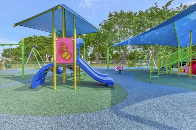 a view of a park with slide