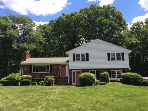 23 Peachtree Road Lexington, MA 02420 - Photo 1 of 30 a front view of a house with a yard