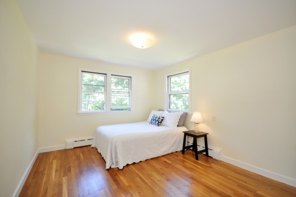 23 Peachtree Road Lexington, MA 02420 - Photo 17 of 30 a bedroom with a bed and a window