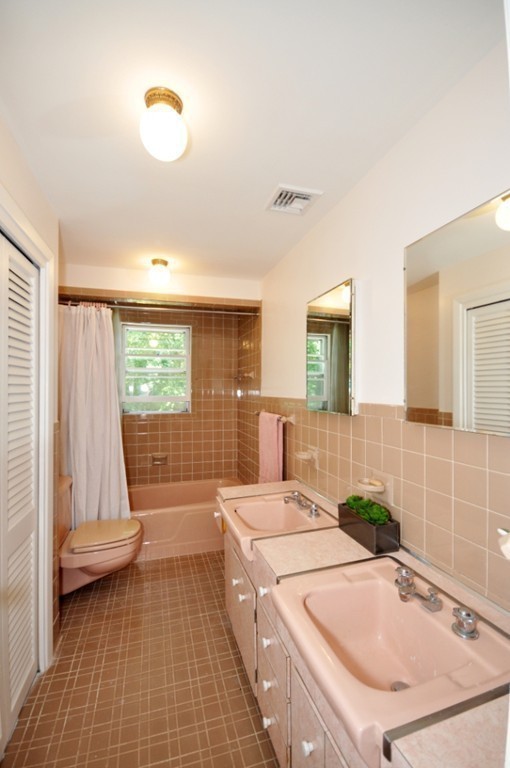 23 Peachtree Road Lexington, MA 02420 - Photo 20 of 30 a bathroom with a sink a toilet and shower