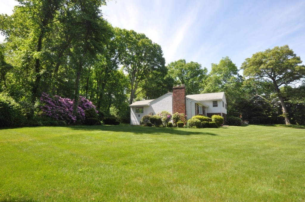 23 Peachtree Road Lexington, MA 02420 - Photo 2 of 30 a view of a house with a yard and sitting area