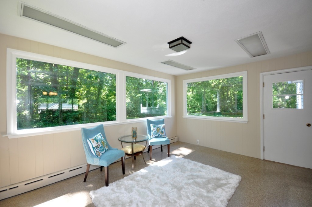 23 Peachtree Road Lexington, MA 02420 - Photo 10 of 30 a living room with furniture and a window