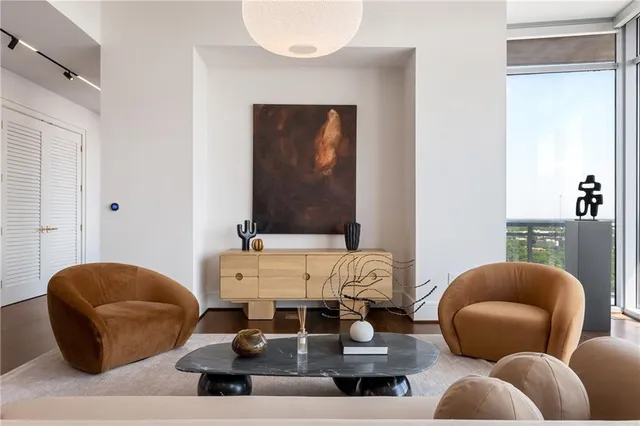 a kitchen with kitchen island cabinets and refrigerator