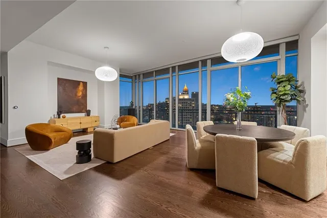 a kitchen with a refrigerator and cabinets