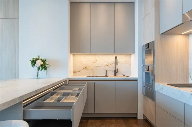 a view of a room with a large window