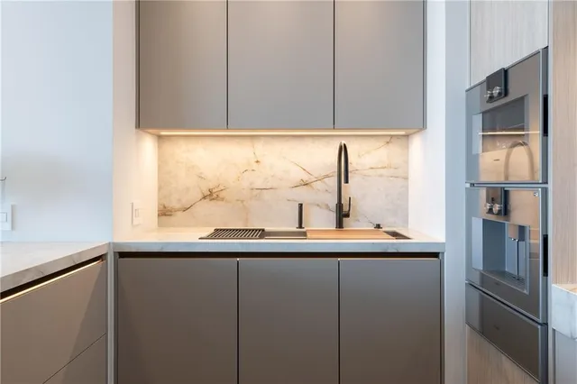 a view of a room with an empty walk in closet