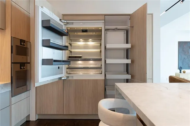 a utility room with sink dryer and washer