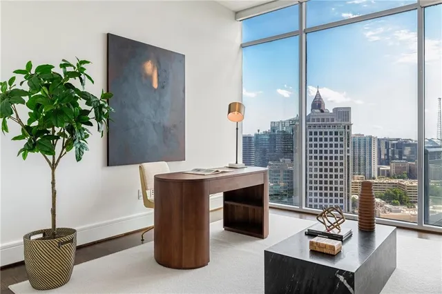 a bedroom with bed and window