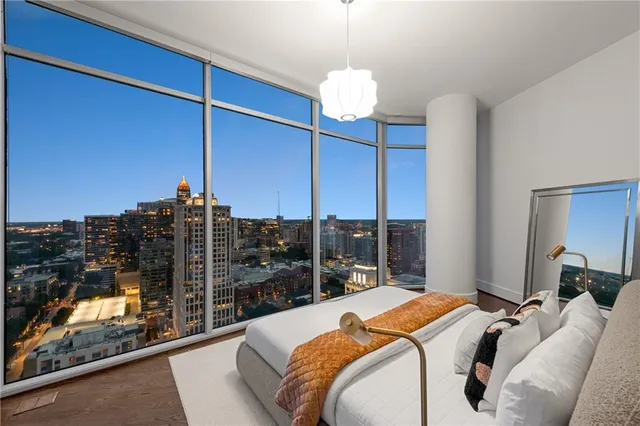 a bathroom with a tub and shower