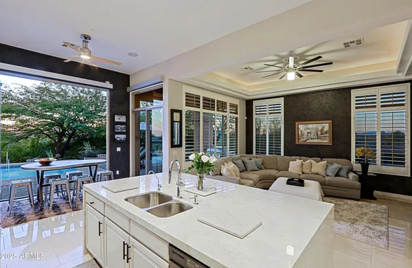 a room with furniture and a flat screen tv