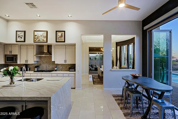 a view of a house with porch and furniture
