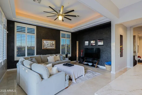 a view of a living room and dining room