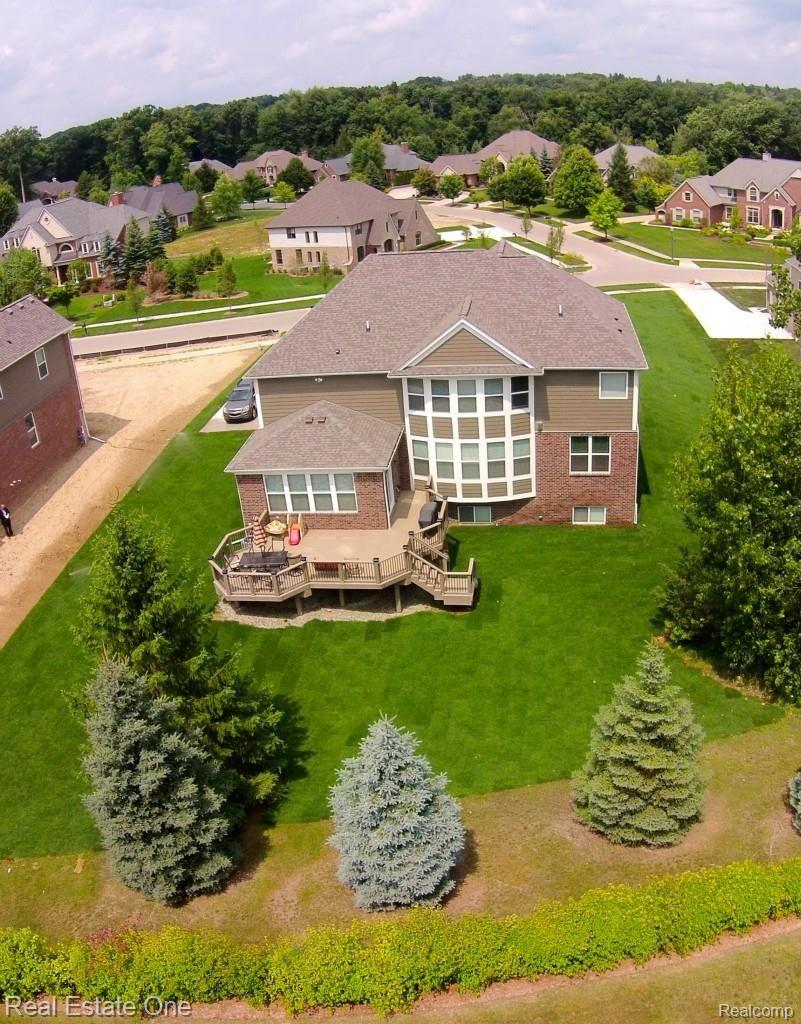 6973 Oakhurst Ridge Road Clarkston, MI 48348 - Photo 4 of 32 Rear View