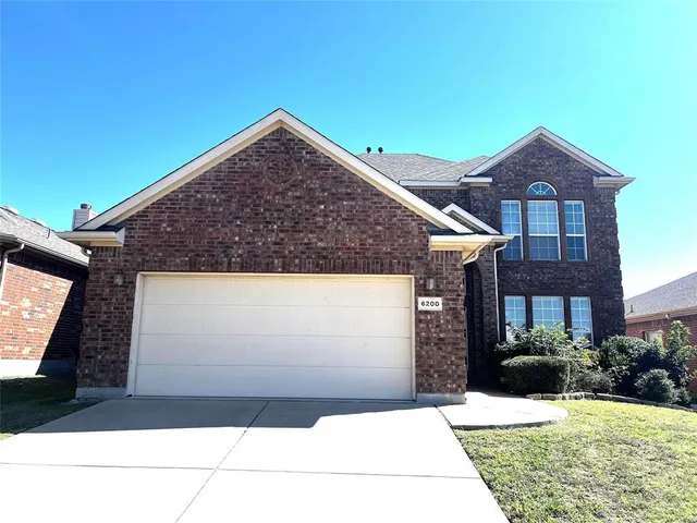 a view of backyard of house
