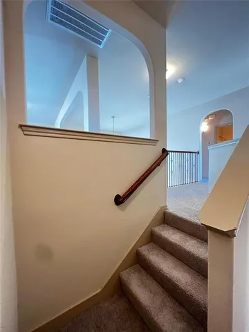 a view of a hallway with workspace